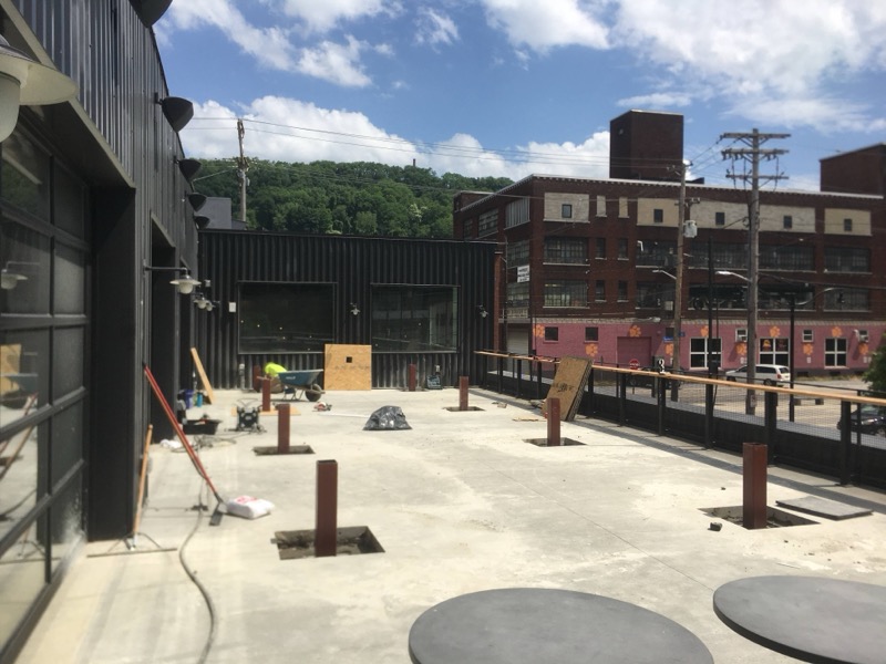 Commercial concrete slab pour with steel bollard posts