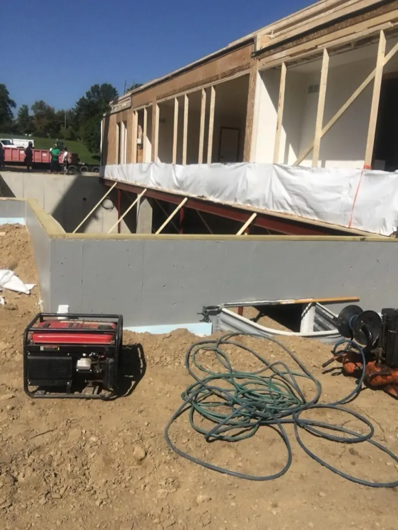 Residential foundation wall with framing starting in Western PA